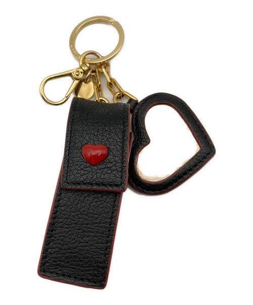 MIU MIU（ミュウミュウ）MIU MIU (ミュウミュウ) MADRAS LOVE TRICKリップケース ブラックの古着・服飾アイテム