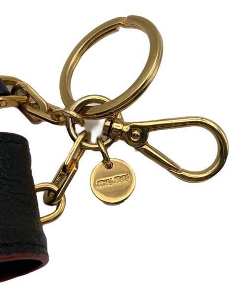 MIU MIU（ミュウミュウ）MIU MIU (ミュウミュウ) MADRAS LOVE TRICKリップケース ブラックの古着・服飾アイテム