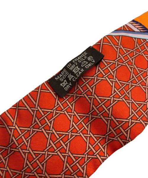 HERMES（エルメス）HERMES (エルメス) LES VOITURES A TRANSFORMATION オレンジの古着・服飾アイテム