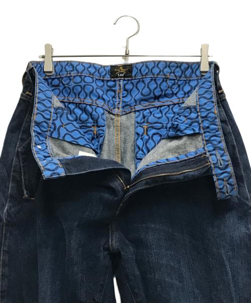 Vivienne Westwood（ヴィヴィアンウエストウッド）Vivienne Westwood (ヴィヴィアンウエストウッド) LEE (リー) 立体裁断デニムパンツ ブルー サイズ: 81cm (W32)の古着・服飾アイテム
