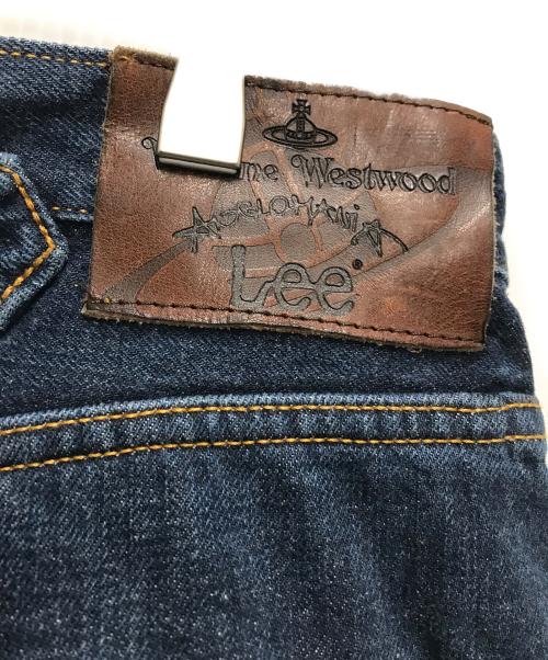 Vivienne Westwood（ヴィヴィアンウエストウッド）Vivienne Westwood (ヴィヴィアンウエストウッド) LEE (リー) 立体裁断デニムパンツ ブルー サイズ: 81cm (W32)の古着・服飾アイテム