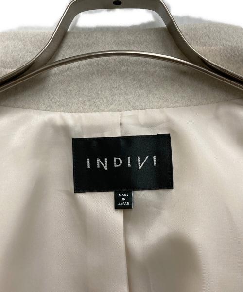 INDIVI（インディヴィ）INDIVI (インディヴィ) スタンドカラーミドルコート アイボリー サイズ:40の古着・服飾アイテム