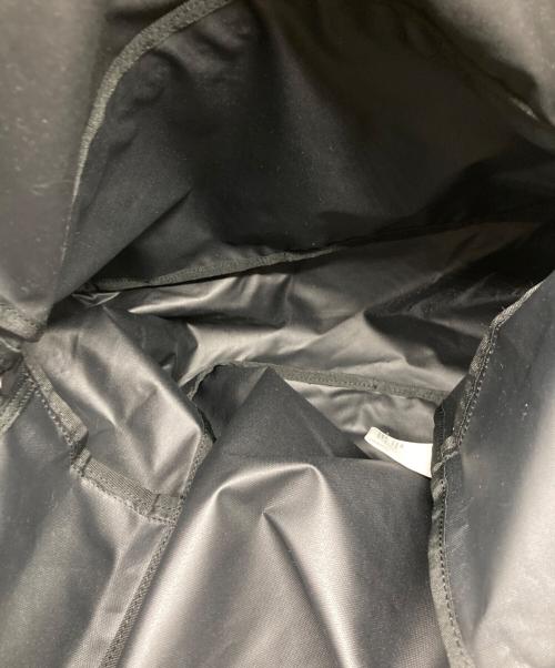 COMME des GARCONS（コムデギャルソン）COMME des GARCONS (コムデギャルソン) FLUORESCENT PRINTED BACKPACK ブラックの古着・服飾アイテム