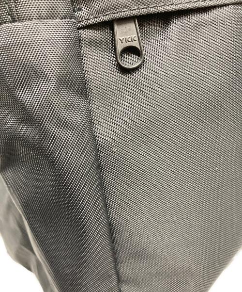 COMME des GARCONS（コムデギャルソン）COMME des GARCONS (コムデギャルソン) FLUORESCENT PRINTED BACKPACK ブラックの古着・服飾アイテム