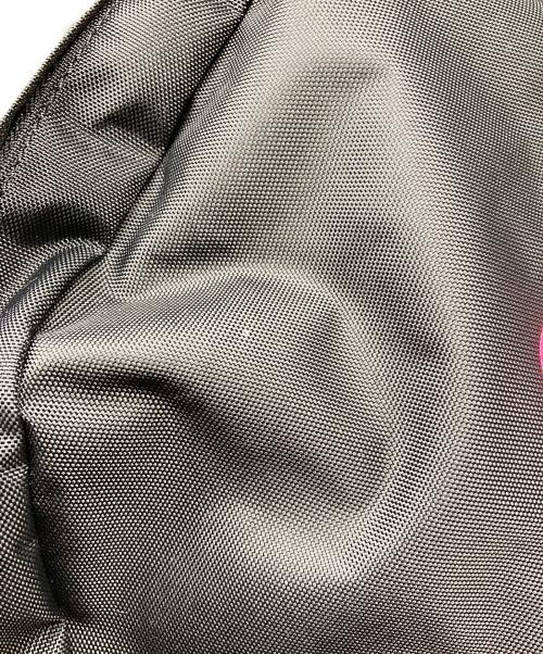 COMME des GARCONS（コムデギャルソン）COMME des GARCONS (コムデギャルソン) FLUORESCENT PRINTED BACKPACK ブラックの古着・服飾アイテム