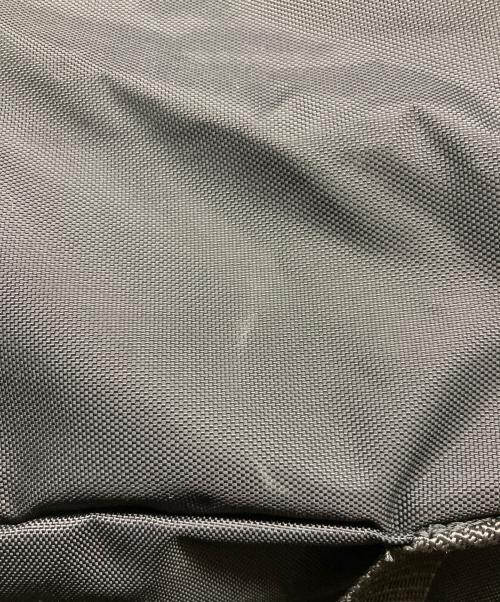 COMME des GARCONS（コムデギャルソン）COMME des GARCONS (コムデギャルソン) FLUORESCENT PRINTED BACKPACK ブラックの古着・服飾アイテム