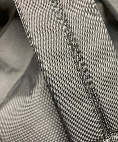 COMME des GARCONS（コムデギャルソン）COMME des GARCONS (コムデギャルソン) FLUORESCENT PRINTED BACKPACK ブラックの古着・服飾アイテム