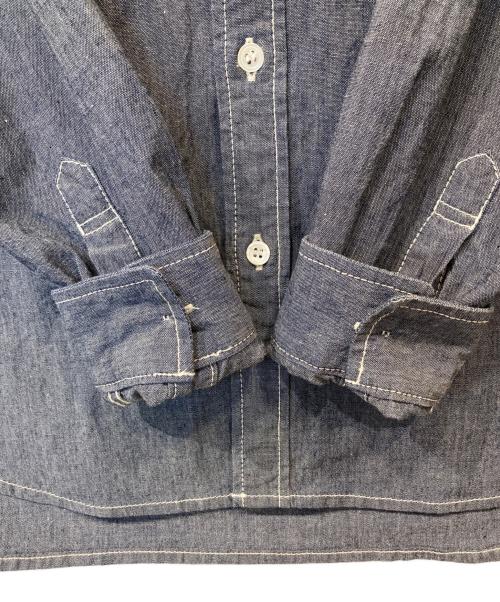 and wander（アンドワンダー）and wander (アンドワンダー) CORDURA indigo chambray collarless shirt コーデュラ・インディゴ・シャンブレー・カラーレス・シャツ 574-1983114 ブルー サイズ:FREEの古着・服飾アイテム