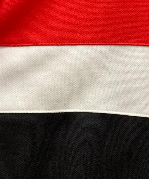 UMBRO（アンブロ）UMBRO (アンブロ) 90s Manchester United TRACK JACKET レッド×ブラック サイズ:Mの古着・服飾アイテム