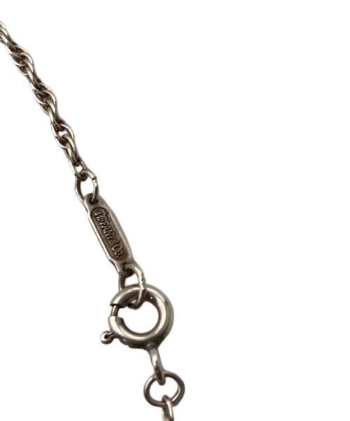 TIFFANY & Co.（ティファニー アンド コー）Tiffany & Co. (ティファニー) ツイストハートネックレス シルバー×ゴールドの古着・服飾アイテム