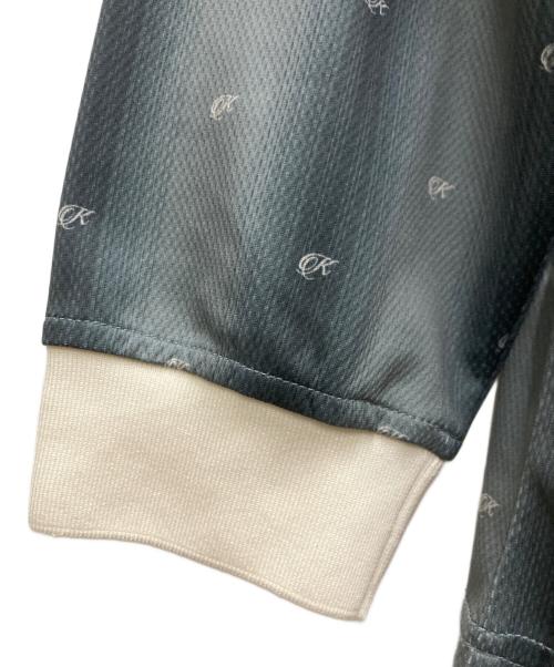 KITH（キス）KITH (キス) モノグラムサテンポロシャツ ブルー サイズ:FREEの古着・服飾アイテム