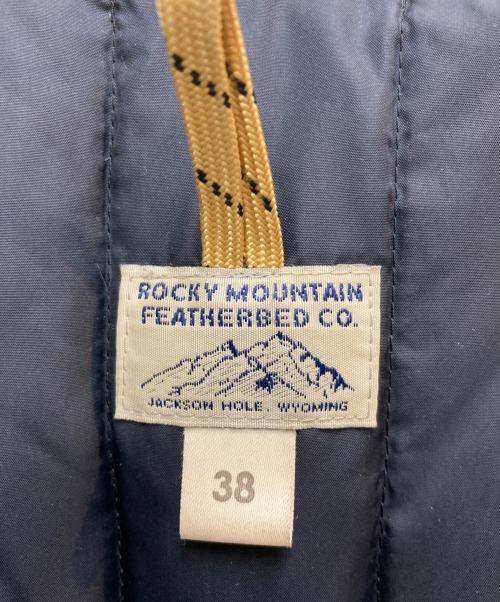 RockyMountainFeatherBed（ロッキーマウンテンフェザーベッド）RockyMountainFeatherBed (ロッキーマウンテンフェザーベッド) ダウンベスト ネイビー サイズ:Mの古着・服飾アイテム