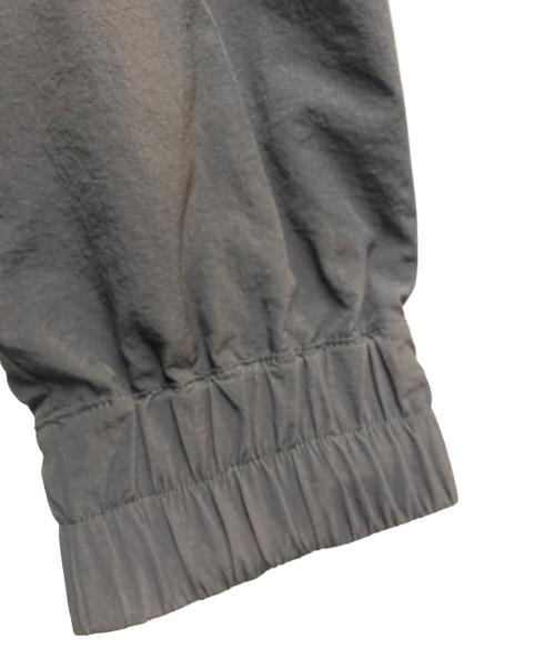 HAMCUS PRMTVSM（ハムカスプリティズム）HAMCUS PRMTVSM (ハムカスプリティズム) ナイロン切替ハーフジップパーカー ブラック サイズ:3の古着・服飾アイテム