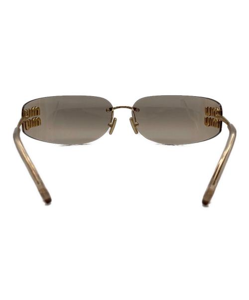 MIU MIU（ミュウミュウ）MIU MIU (ミュウミュウ) 夜明けのサングラス ゴールド サイズ:75□14 110の古着・服飾アイテム