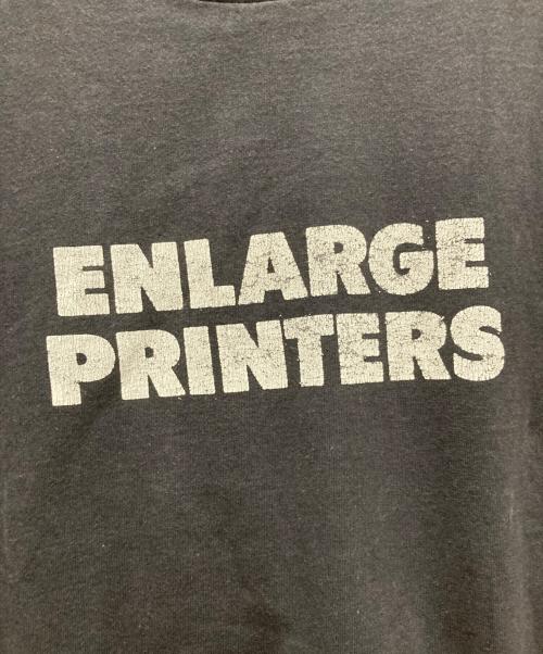 ENLARGE PRINTERS（エンラージ・プリンターズ）ENLARGE PRINTERS (エンラージ・プリンターズ) FIGURE別注TEE ブラック サイズ:2の古着・服飾アイテム