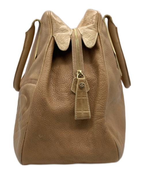 Vivienne Westwood（ヴィヴィアンウエストウッド）Vivienne Westwood (ヴィヴィアンウエストウッド) レザーオーブロゴハンドバッグ ベージュの古着・服飾アイテム