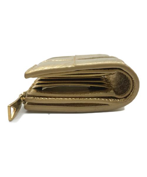 BOTTEGA VENETA（ボッテガベネタ）BOTTEGA VENETA (ボッテガベネタ) 2つ折り財布 ゴールドの古着・服飾アイテム