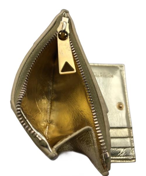 BOTTEGA VENETA（ボッテガベネタ）BOTTEGA VENETA (ボッテガベネタ) 2つ折り財布 ゴールドの古着・服飾アイテム