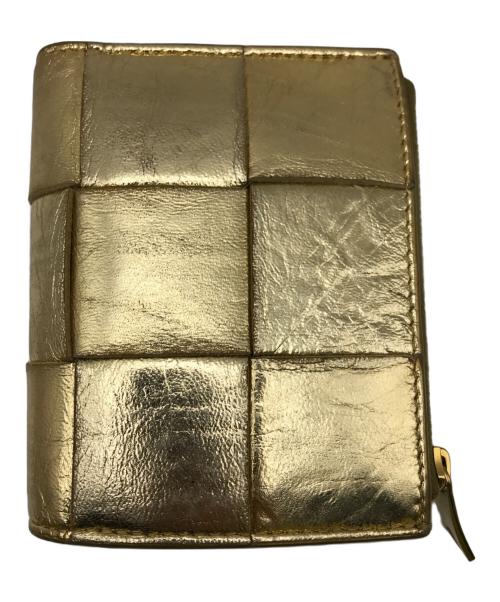 BOTTEGA VENETA（ボッテガベネタ）BOTTEGA VENETA (ボッテガベネタ) 2つ折り財布 ゴールドの古着・服飾アイテム