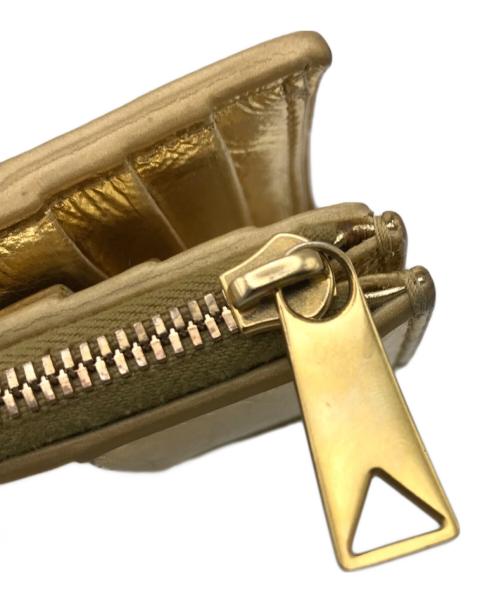 BOTTEGA VENETA（ボッテガベネタ）BOTTEGA VENETA (ボッテガベネタ) 2つ折り財布 ゴールドの古着・服飾アイテム