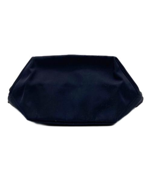 TORY BURCH（トリーバーチ）TORY BURCH (トリーバーチ) ナイロンフラップリュック ネイビーの古着・服飾アイテム