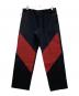 asics（アシックス）の古着「LIATRISORY TROUSER」｜ブラック×レッド