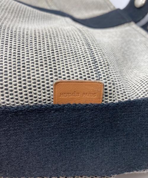 HERMES（エルメス）HERMES (エルメス) サクソーMM/キャンバスハンドバッグ グレー×ブラックの古着・服飾アイテム