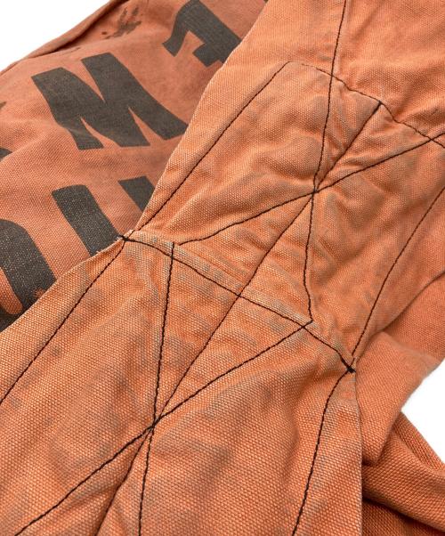 BOWWOW（バウワウ）BOWWOW (バウワウ) THE DITC NEWSPAPER BAG AGED オレンジの古着・服飾アイテム