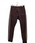 NIKE×UNDERCOVERナイキ×アンダーカバー）の古着「Gyakusou Team ナイロントラックパンツ」｜パープル