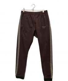 NIKE×UNDERCOVER（ナイキ×アンダーカバー）の古着「Gyakusou Team ナイロントラックパンツ」｜パープル