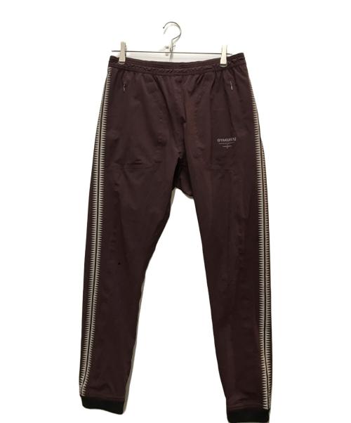 NIKE（ナイキ）NIKE (ナイキ) UNDERCOVER (アンダーカバー) Gyakusou Team ナイロントラックパンツ パープル サイズ:Mの古着・服飾アイテム