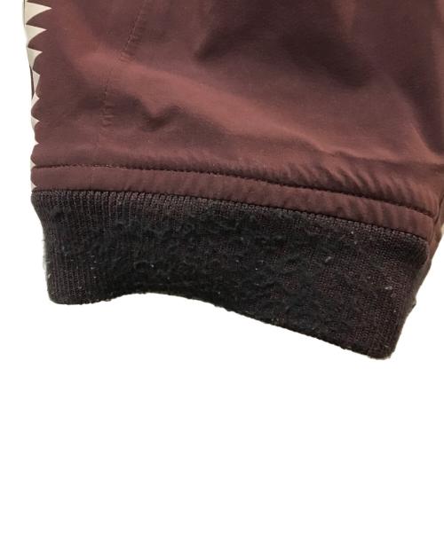 NIKE（ナイキ）NIKE (ナイキ) UNDERCOVER (アンダーカバー) Gyakusou Team ナイロントラックパンツ パープル サイズ:Mの古着・服飾アイテム