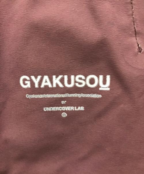 NIKE（ナイキ）NIKE (ナイキ) UNDERCOVER (アンダーカバー) Gyakusou Team ナイロントラックパンツ パープル サイズ:Mの古着・服飾アイテム