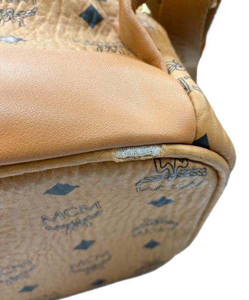 MCM（エムシーエム）MCM (エムシーエム) スタッズバックパック ブラウンの古着・服飾アイテム