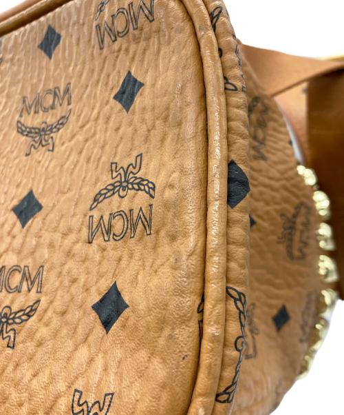 MCM（エムシーエム）MCM (エムシーエム) スタッズバックパック ブラウンの古着・服飾アイテム