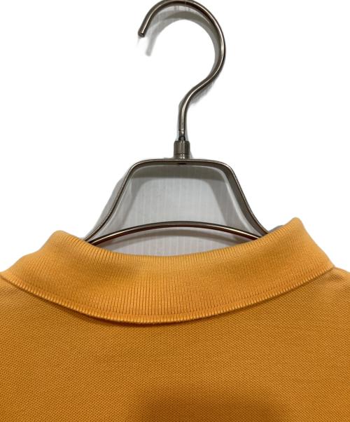 Burberry's（バーバリーズ）Burberry's (バーバリーズ) ポロシャツ オレンジ サイズ:記載なしの古着・服飾アイテム