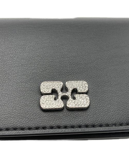 GANNI（ガニー）Ganni (ガニー) Bou Flap Card Holder ブラックの古着・服飾アイテム
