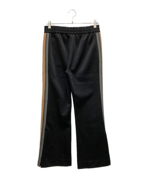 MARC JACOBS（マークジェイコブス）MARC JACOBS (マークジェイコブス) サイドラインフレアトラックパンツ ブラック サイズ:00の古着・服飾アイテム