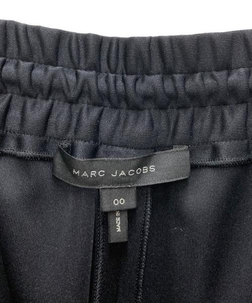 MARC JACOBS（マークジェイコブス）MARC JACOBS (マークジェイコブス) サイドラインフレアトラックパンツ ブラック サイズ:00の古着・服飾アイテム