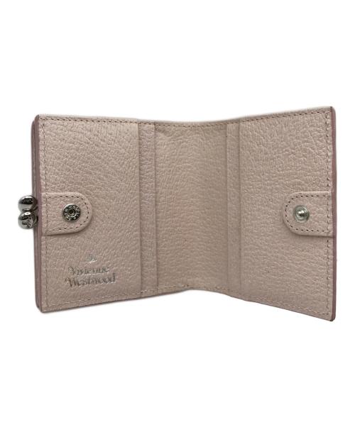 Vivienne Westwood（ヴィヴィアンウエストウッド）Vivienne Westwood (ヴィヴィアンウエストウッド) 口金2つ折りミニ財布 ピンクの古着・服飾アイテム
