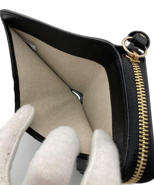 JIMMY CHOO（ジミーチュウ）JIMMY CHOO (ジミーチュウ) スタースタッズウォレット ブラックの古着・服飾アイテム