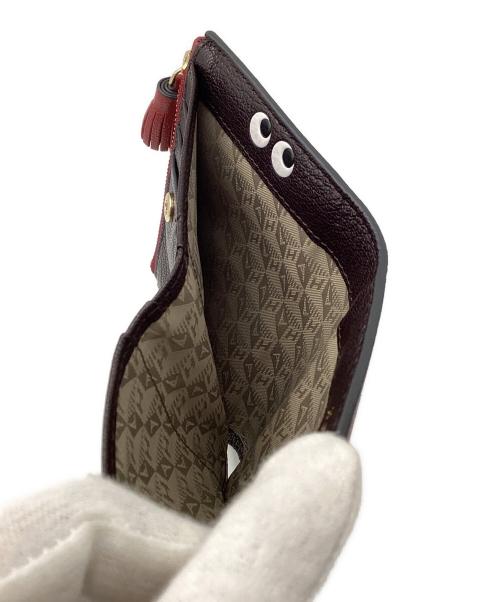 ANYA HINDMARCH（アニヤ・ハインドマーチ）ANYA HINDMARCH (アニヤ・ハインドマーチ) PEEPING EYES SMALL DOUBLE ZIP WALLET レッド サイズ:ONESIZEの古着・服飾アイテム