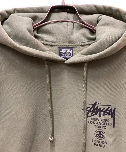 stussy（ステューシー）stussy (ステューシー) World Tour Hoodie カーキ サイズ:Sの古着・服飾アイテム
