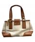 COACH (コーチ) ターンロック ハンドバッグ アイボリー×ブラウン：12000円
