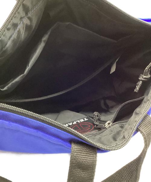 EASTPAK（イーストパック）EASTPAK (イーストパック) TELFAR (テルファー) 2WAYバックパック ブルーの古着・服飾アイテム