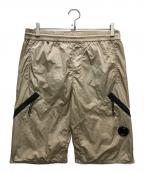 C.P COMPANYシーピーカンパニー）の古着「Chrome-R Lens Nylon Zipper Half Pants / Shorts ハーフパンツ」｜ベージュ