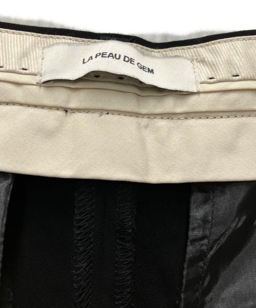 la peau de gem（ラポドゥジェム）la peau de gem (ラポドゥジェム) button slacks ブラック サイズ:36の古着・服飾アイテム