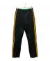 adidas（アディダス）の古着「KNIT TRACK PANTS」｜ブラック×イエロー