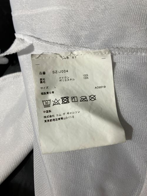 CDG（シーディージー）CDG (シーディージー) バッグプリントコーチジャケット ブラック サイズ:Ｌの古着・服飾アイテム