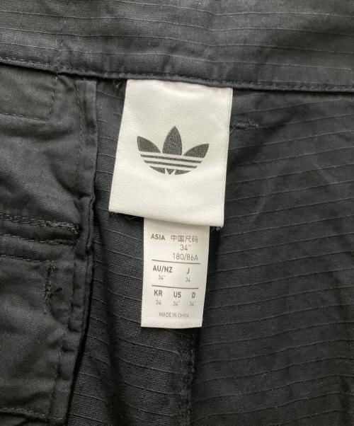 adidas（アディダス）adidas (アディダス) ADILENIUM 5.0 CARGO PANTS ブラック サイズ:34の古着・服飾アイテム